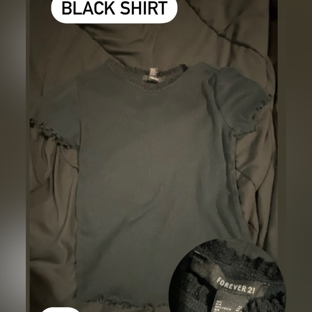 Black shirt with ruffles